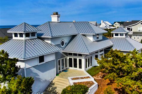 house with ocean blue metal roof|metal roof coastal house.